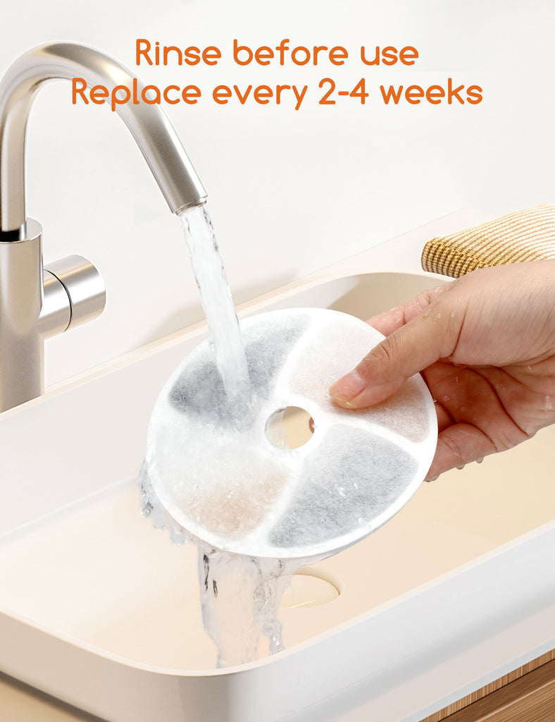 Hand rinsing a Meowant pet fountain filter under a faucet, with text advising to rinse before use and replace every 2-4 weeks