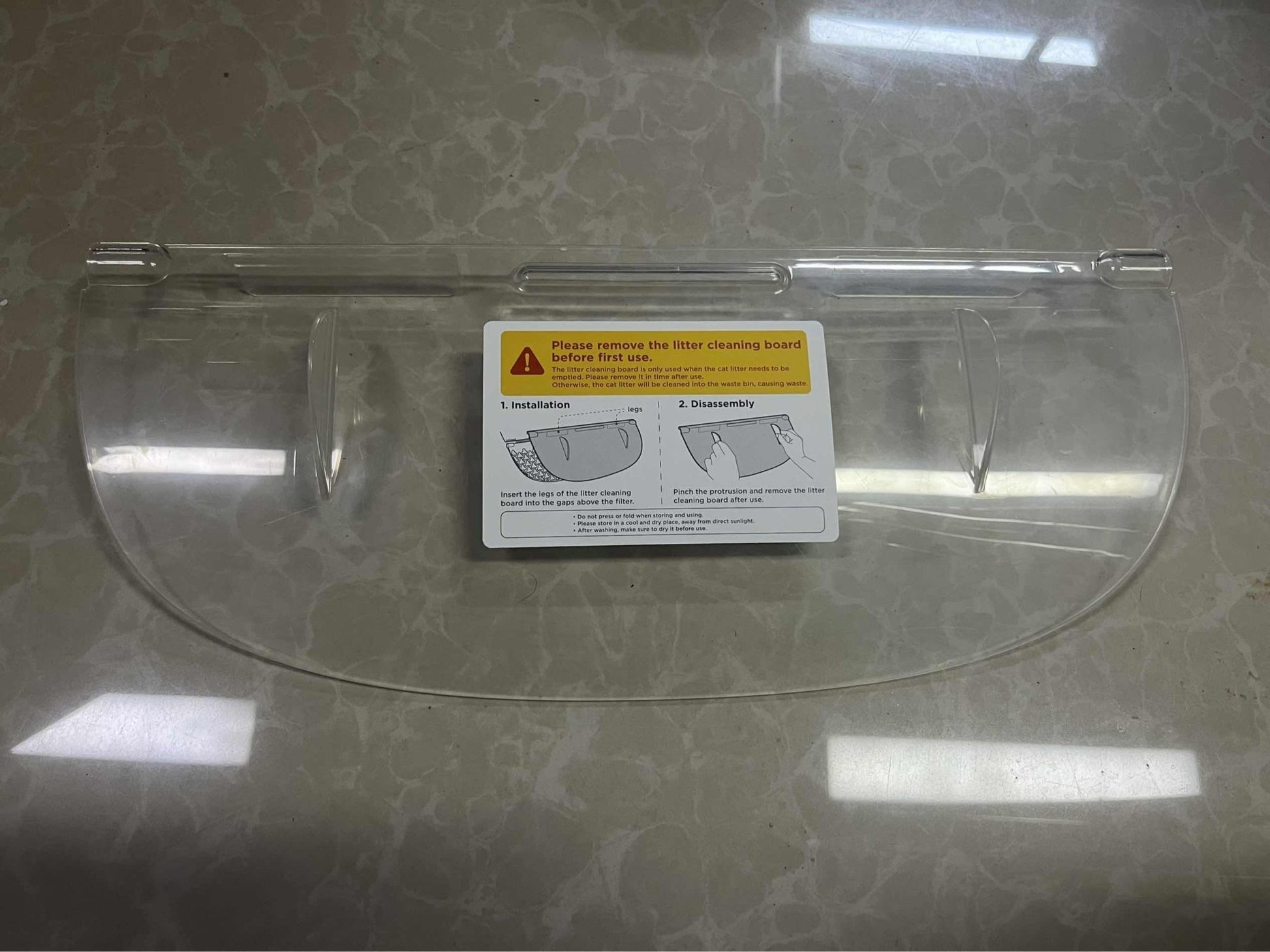 Clear plastic litter cleaning board accessory with installation guide for SC01/SC02/LR01 smart litter box.